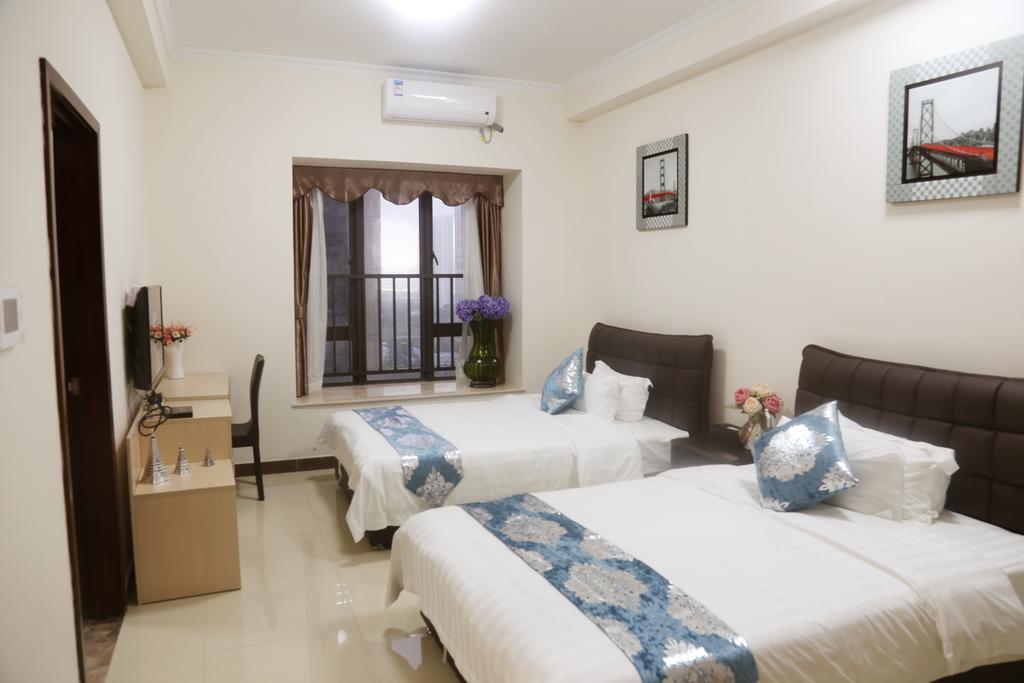 Guangzhou Yi Long International Apartment Habitación foto